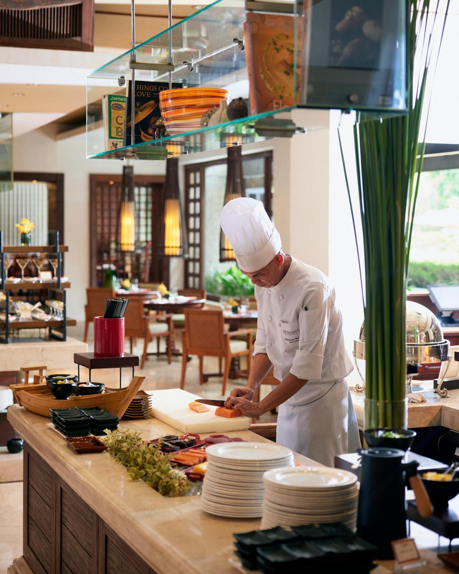 فندق بينينسيولا مانيلا ماكاتي المظهر الخارجي الصورة A chef at work